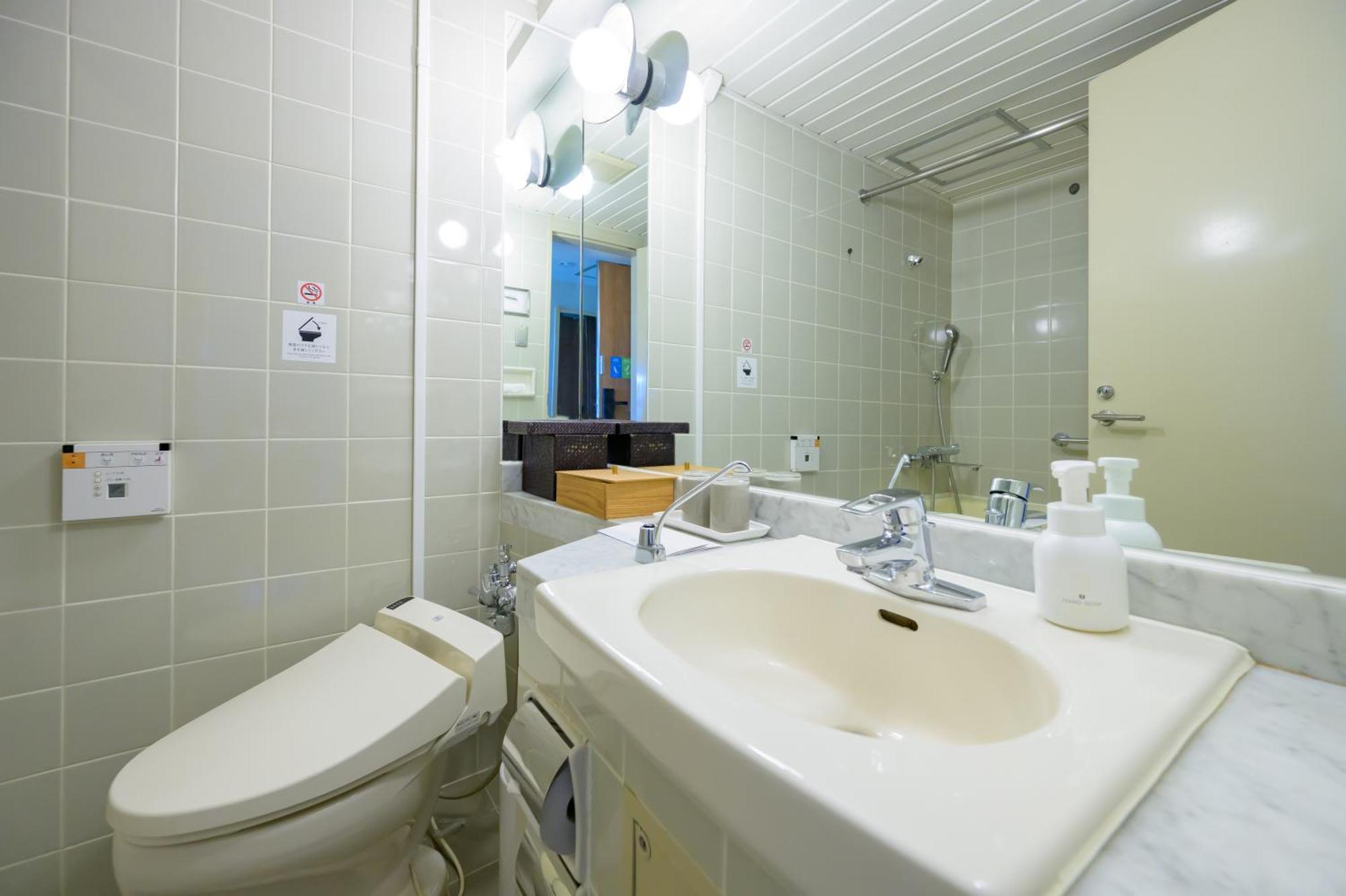 Toba International Hotel Chambre photo
